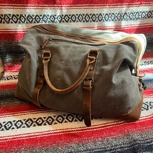 Heavy Duty Tanned leather and canvas duffel bag